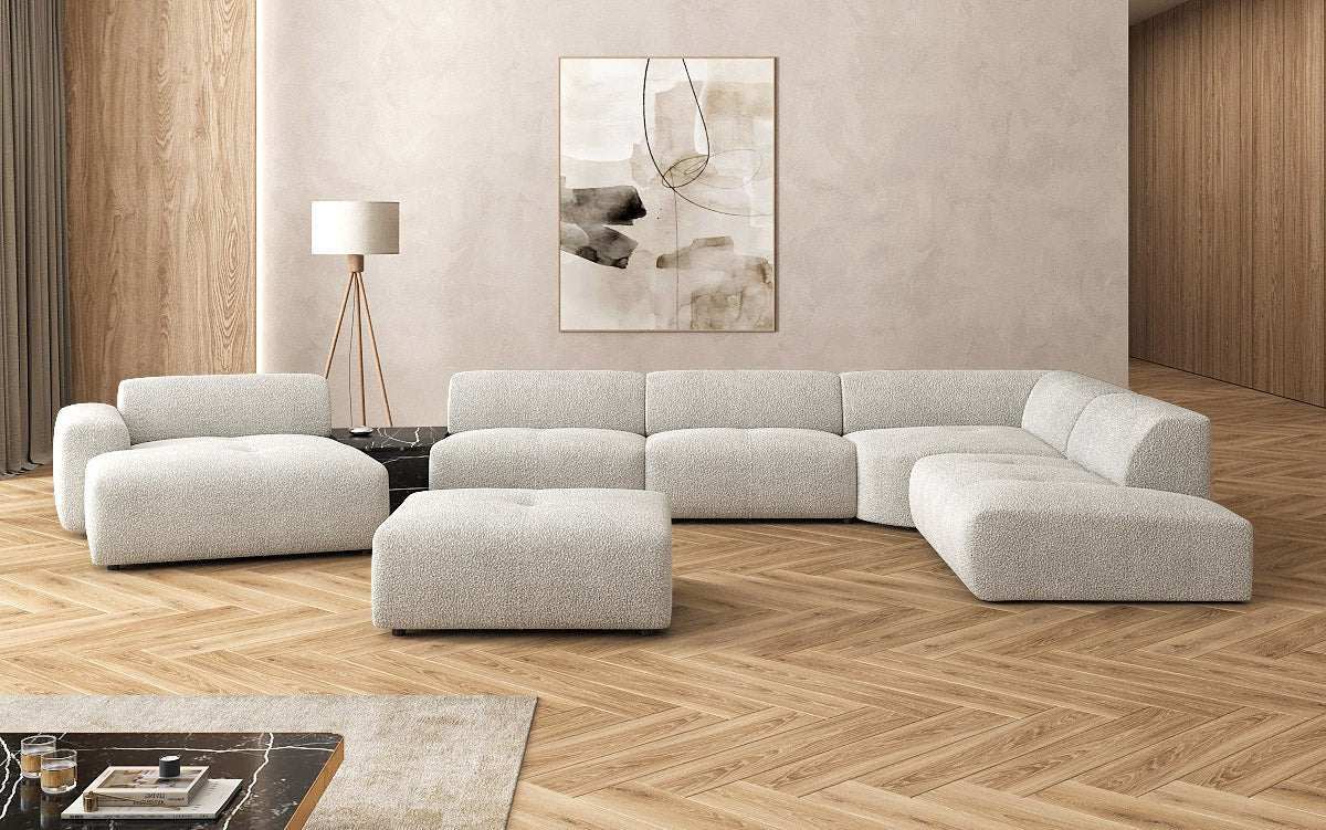 Designer Wohnlandschaft Calm mit Beistellhocker in Bouclé