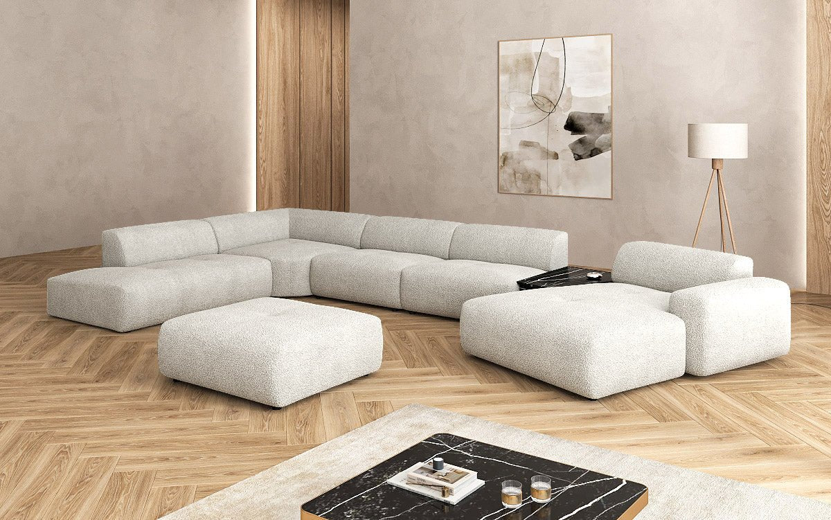 Designer Wohnlandschaft Calm mit Beistellhocker in Bouclé