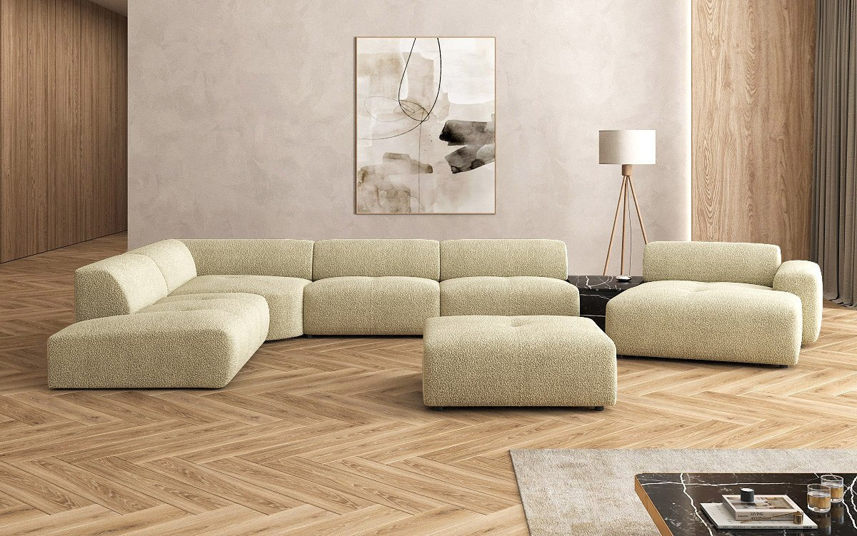 Designer Wohnlandschaft Calm mit Beistellhocker in Bouclé