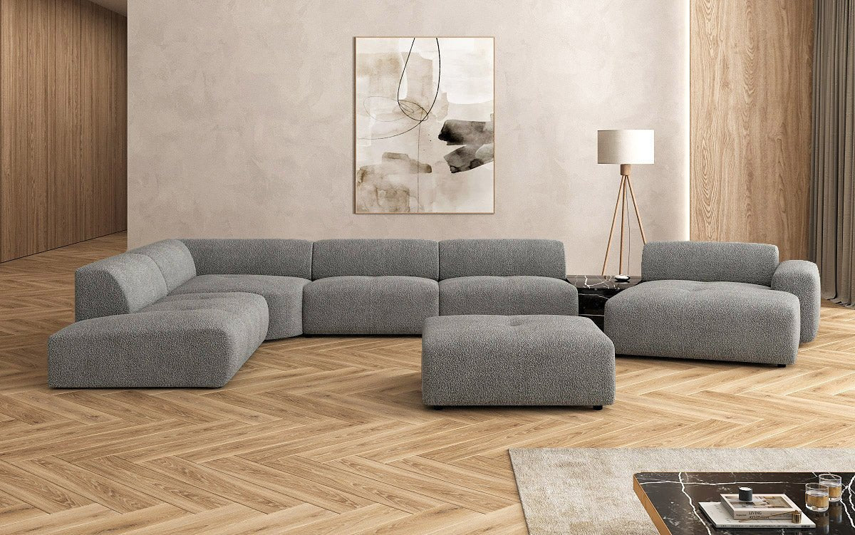 Designer Wohnlandschaft Calm mit Beistellhocker in Bouclé