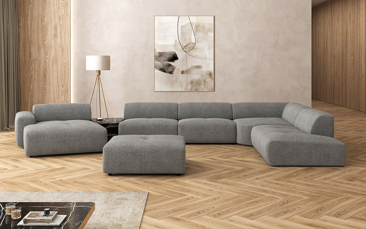 Designer Wohnlandschaft Calm mit Beistellhocker in Bouclé