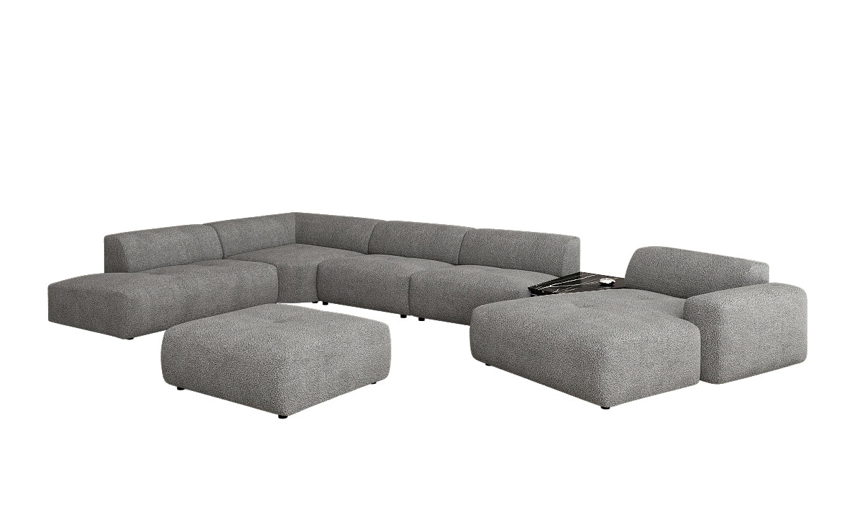 Designer Wohnlandschaft Calm mit Beistellhocker in Bouclé