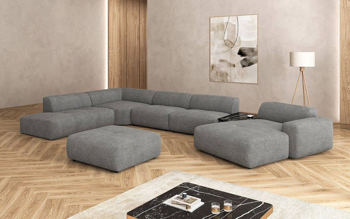 Designer Wohnlandschaft Calm mit Beistellhocker in Bouclé