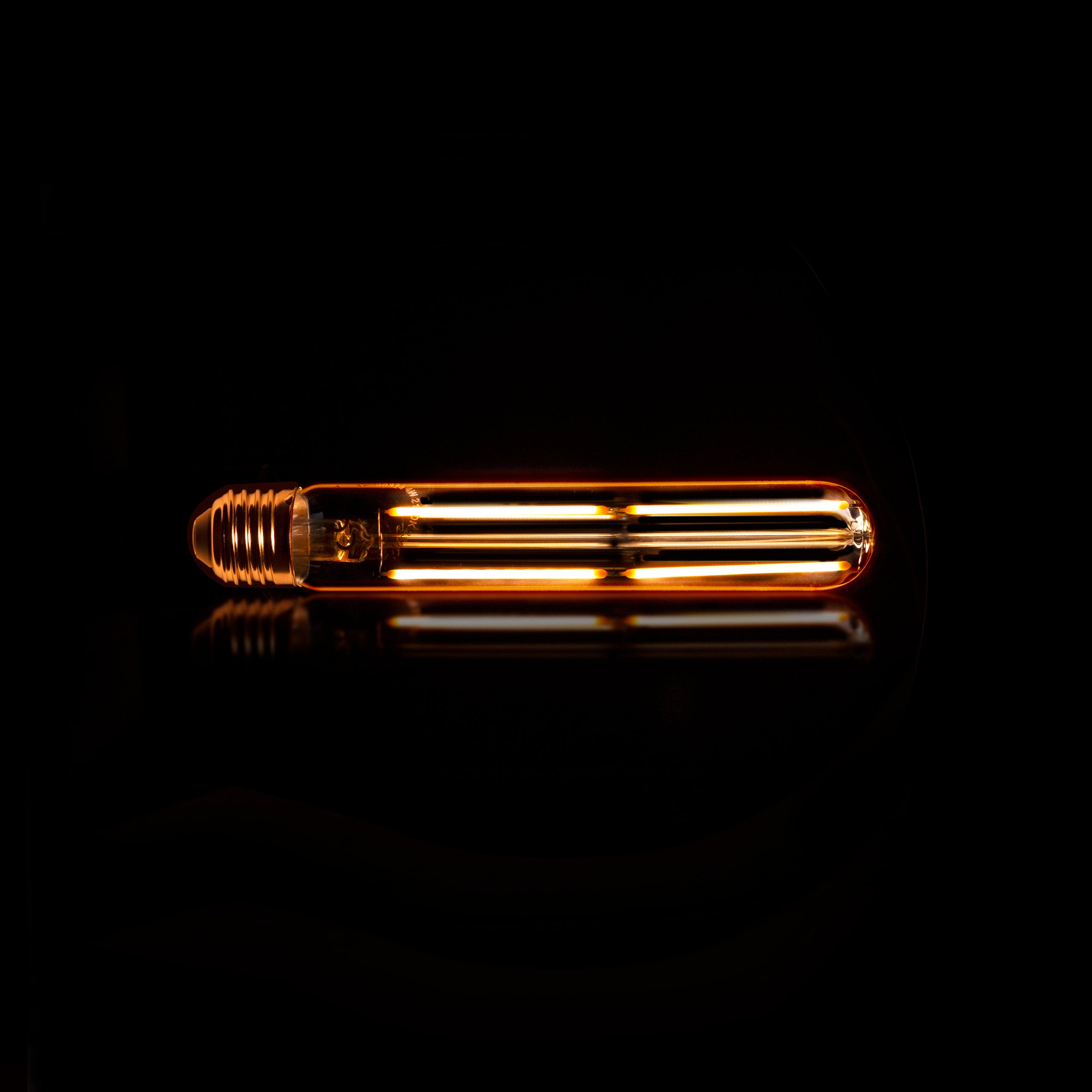 LED-Glühlampe Tavio – T32-E27 in Röhrenform mit amberfarbenem Glas