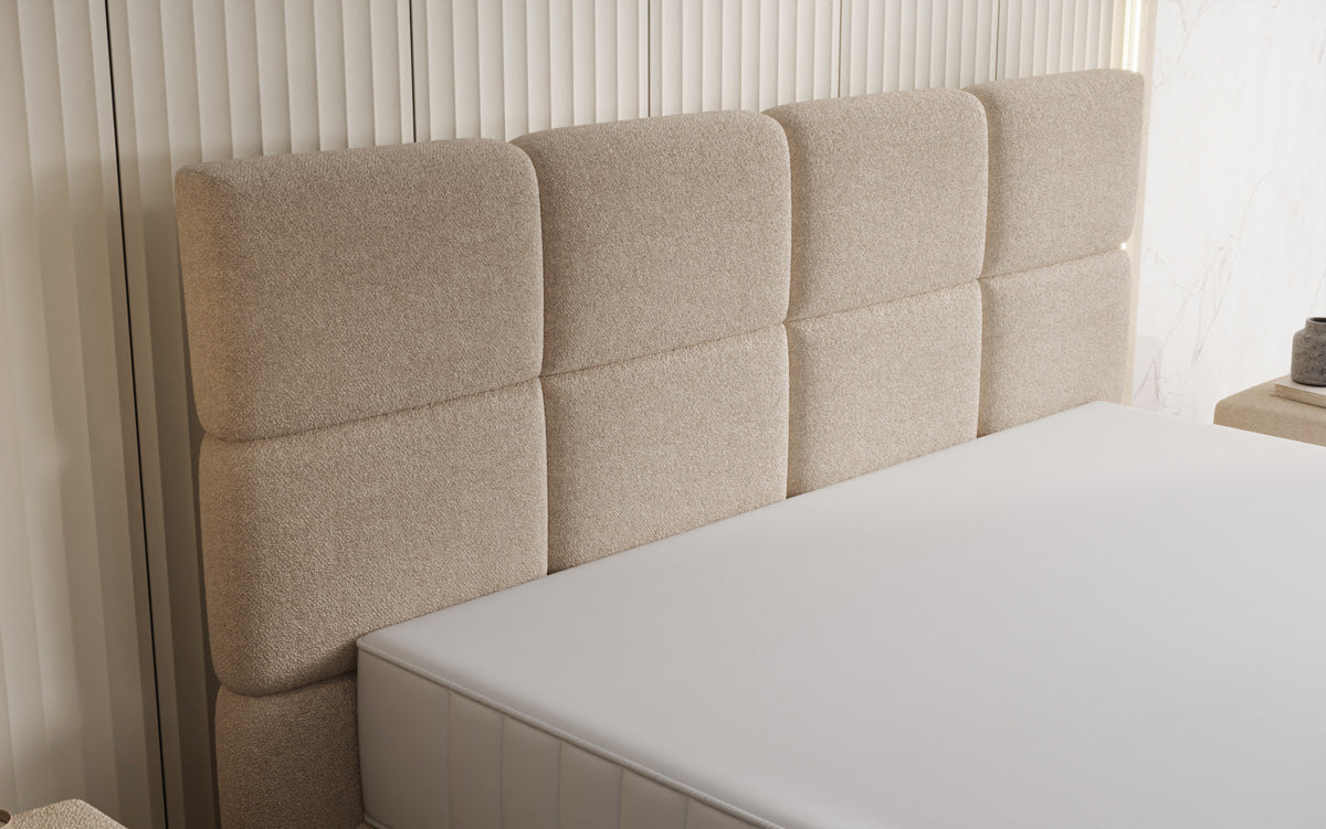 Boxspringbett Nessa mit hohen Füßen in Teddy Bouclé