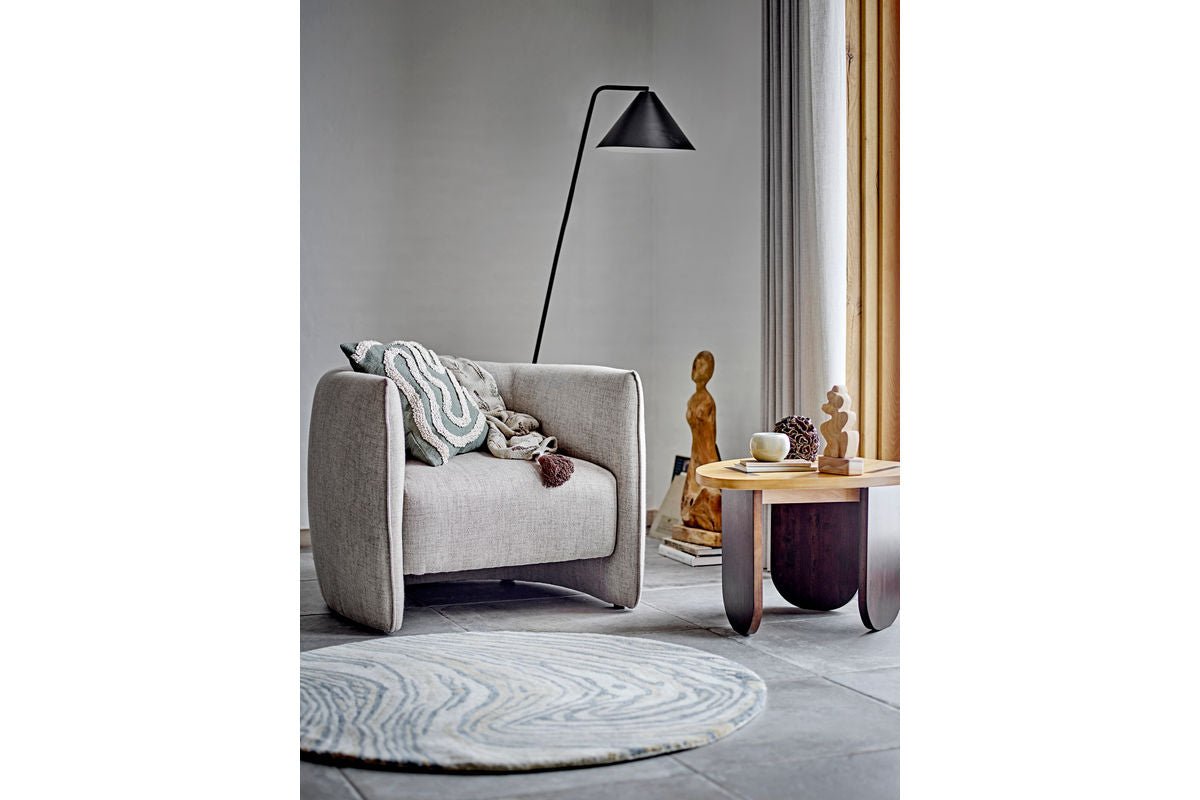 Teppich Niro – Runde Form mit organischem Muster in Braun & Blau