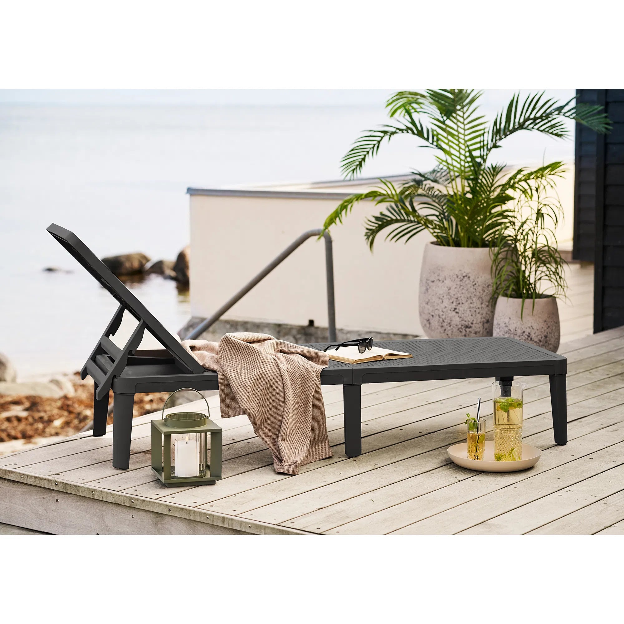 Kerzenlaterne Eirnova – aus Metall und Glas gefertigt