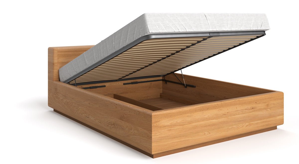 Designer Holzbett Calveno aus massiver Eiche mit Stauraum und geraden Headboard