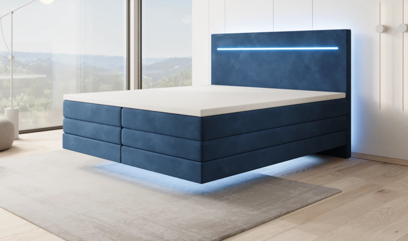 Schwebendes Boxspringbett in Samt Blau bei Tag