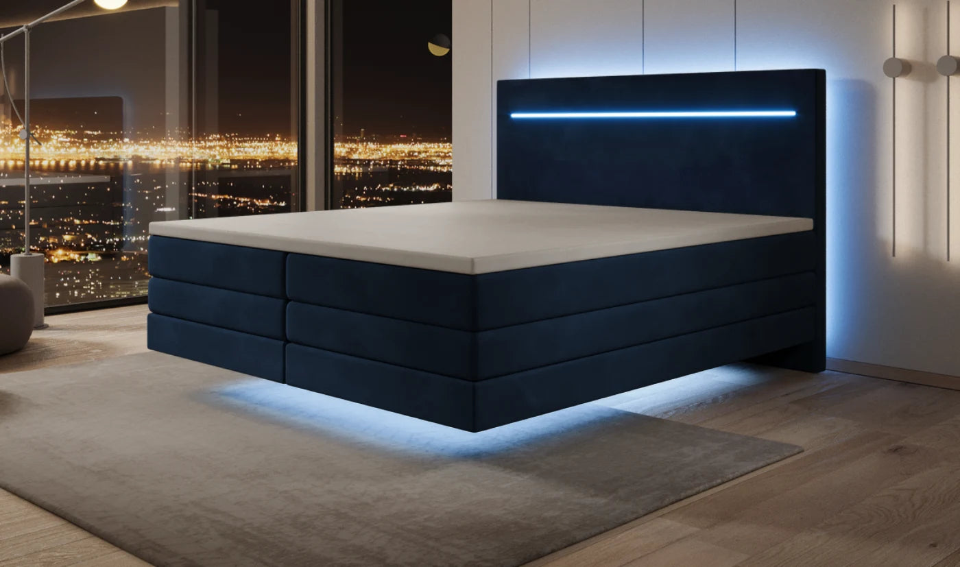 Dasselbe Boxspringbett bei Nacht mit LED-Beleuchtung